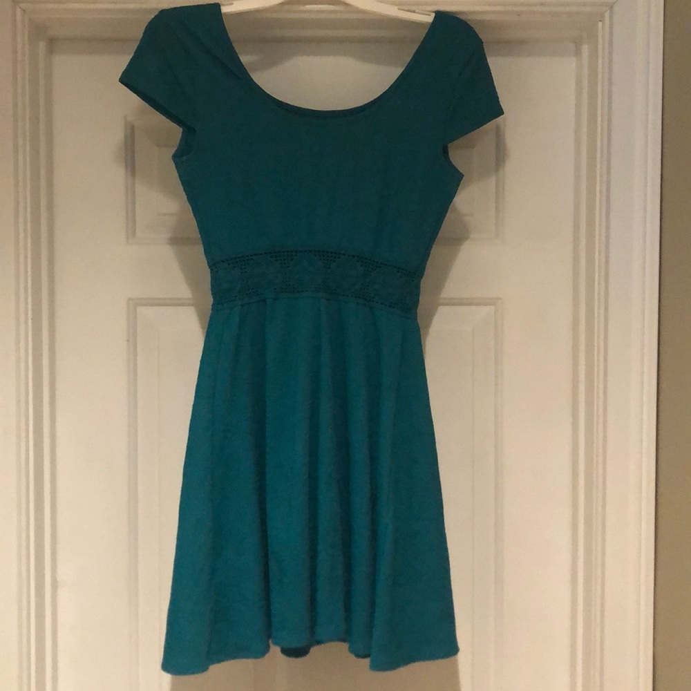 Teal dress with peakaboo belt